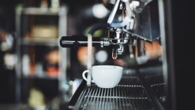 Modern automated coffee brewing equipment in commercial kitchen setting