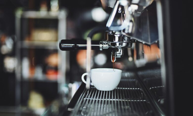 Modern automated coffee brewing equipment in commercial kitchen setting