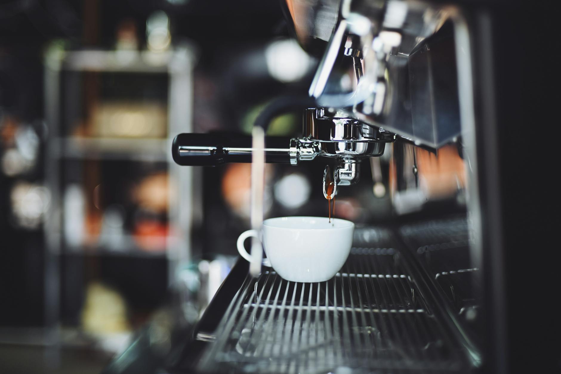 Modern automated coffee brewing equipment in commercial kitchen setting
