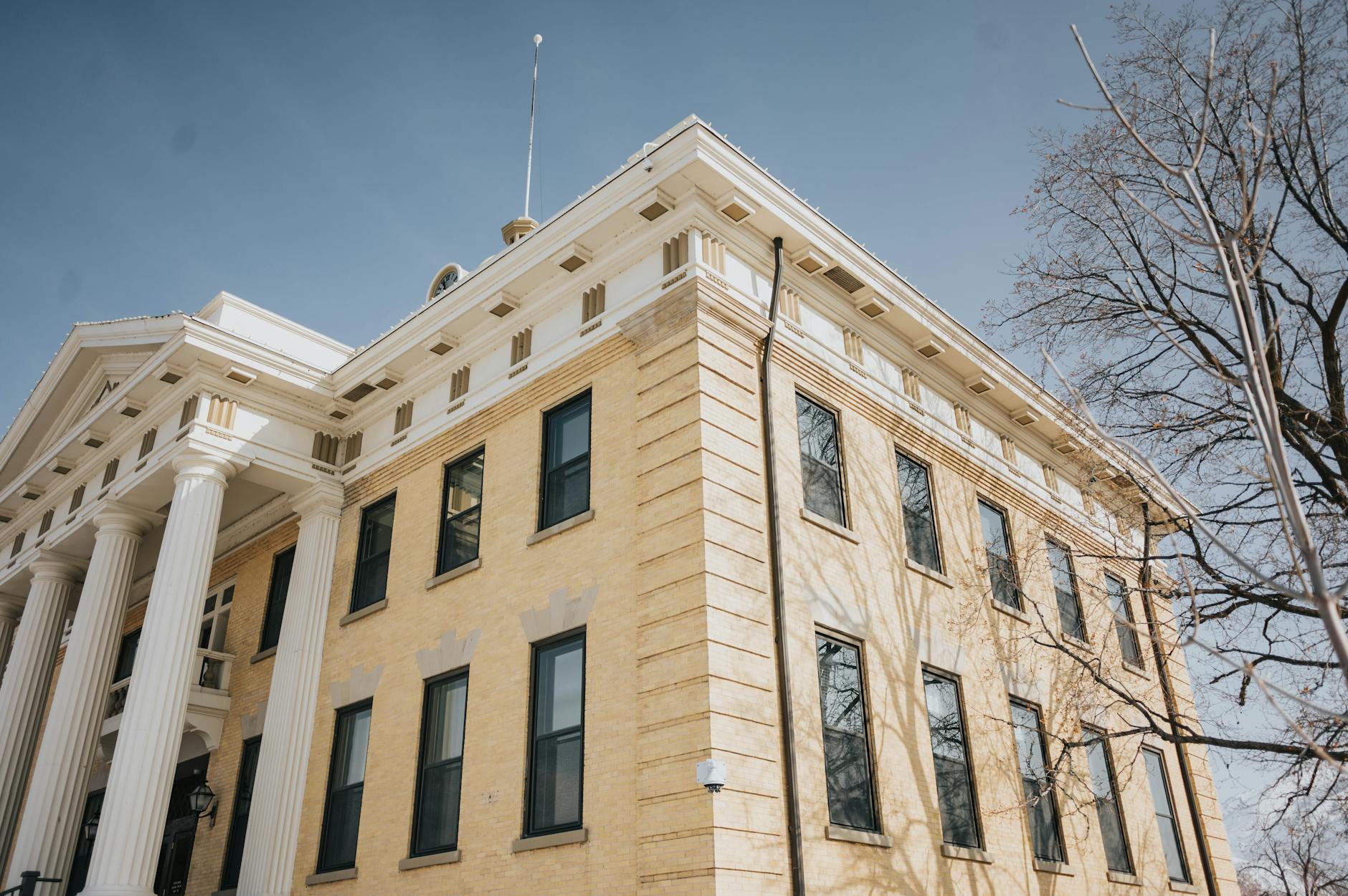 Modern courthouse building representing legal proceedings and regulatory investigations