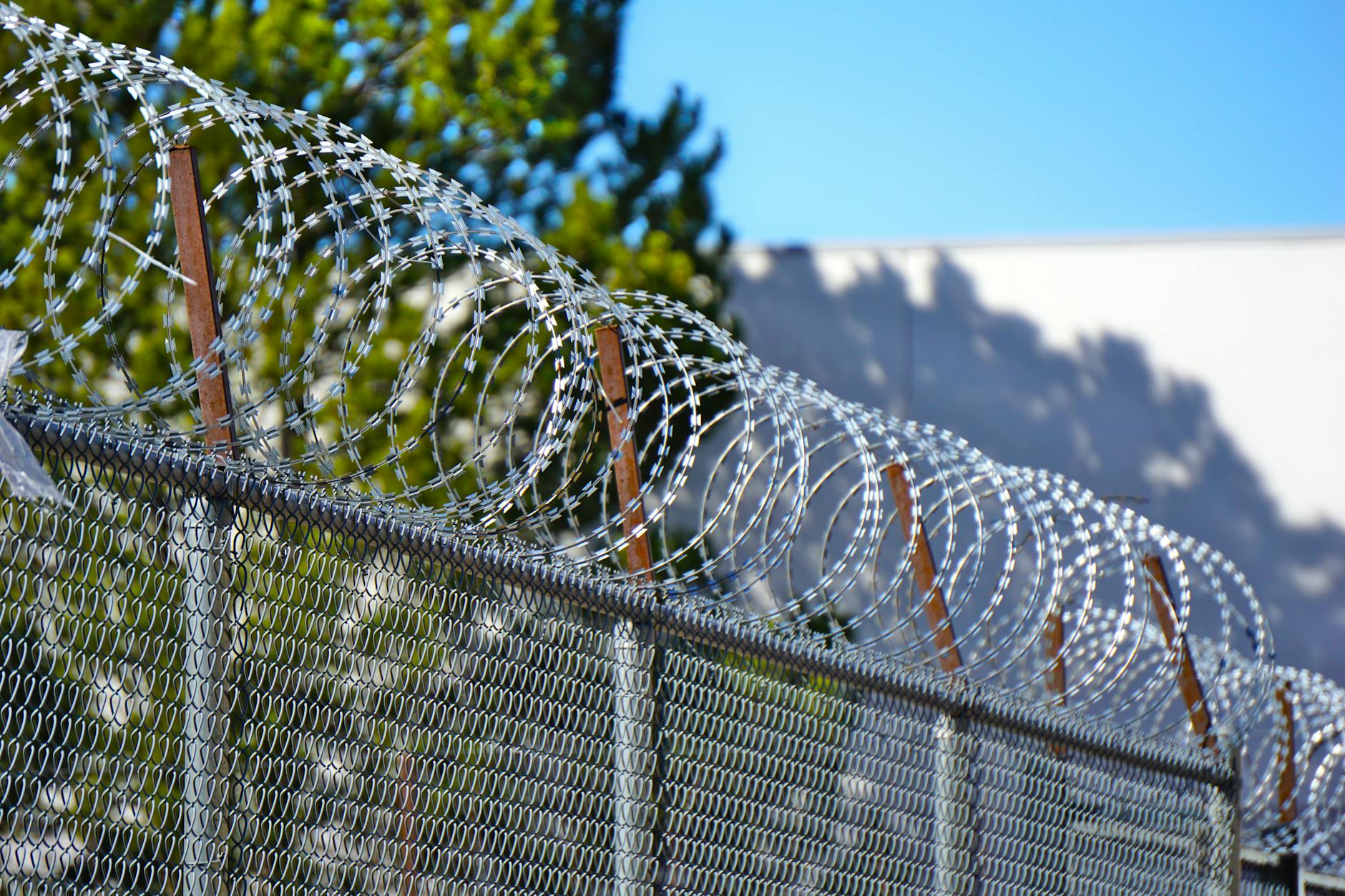 Military border fence representing India-Pakistan disputed territories