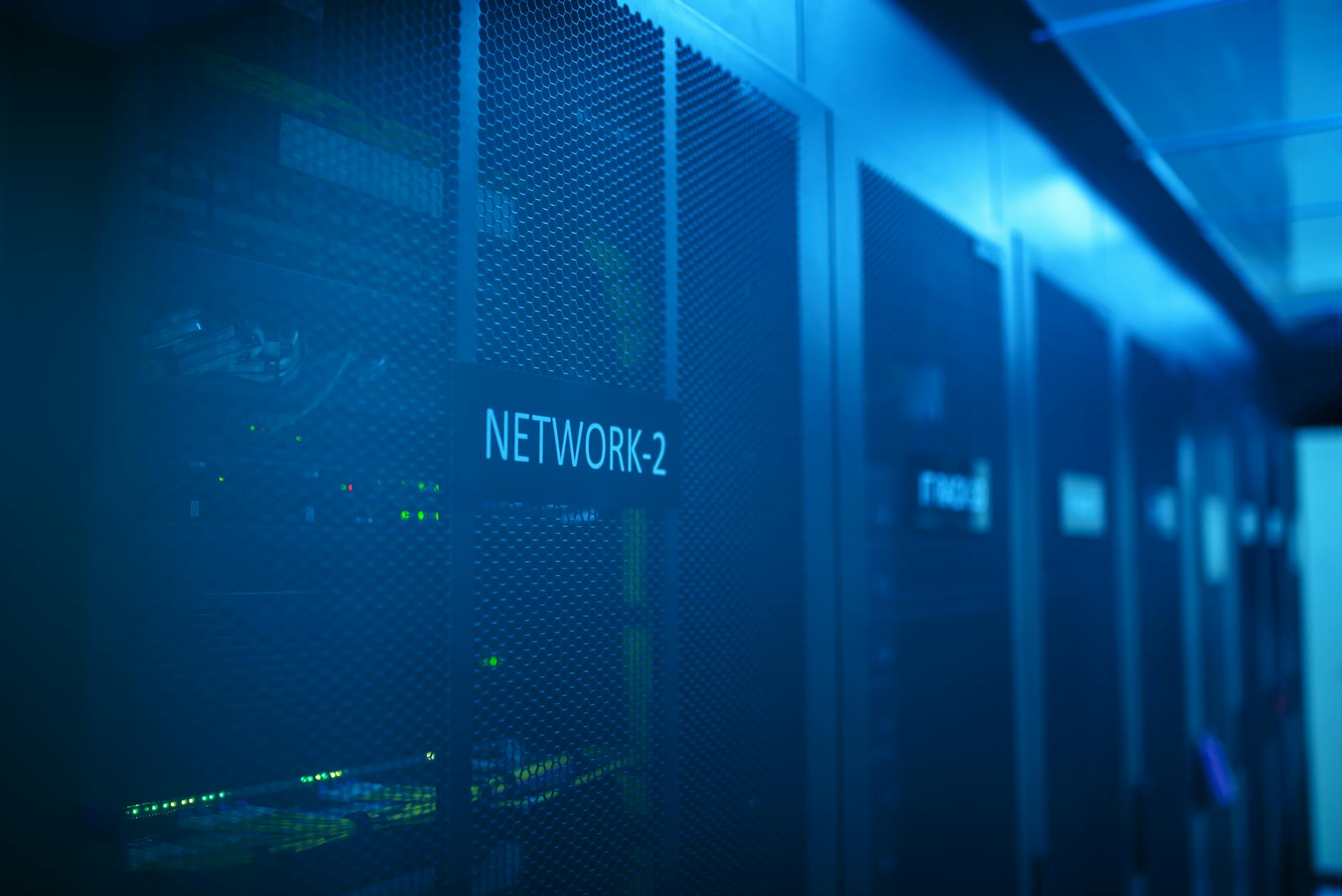 Modern data center with rows of servers and networking equipment