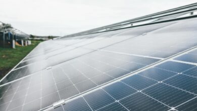 Solar panel installation with battery storage system showing renewable energy infrastructure