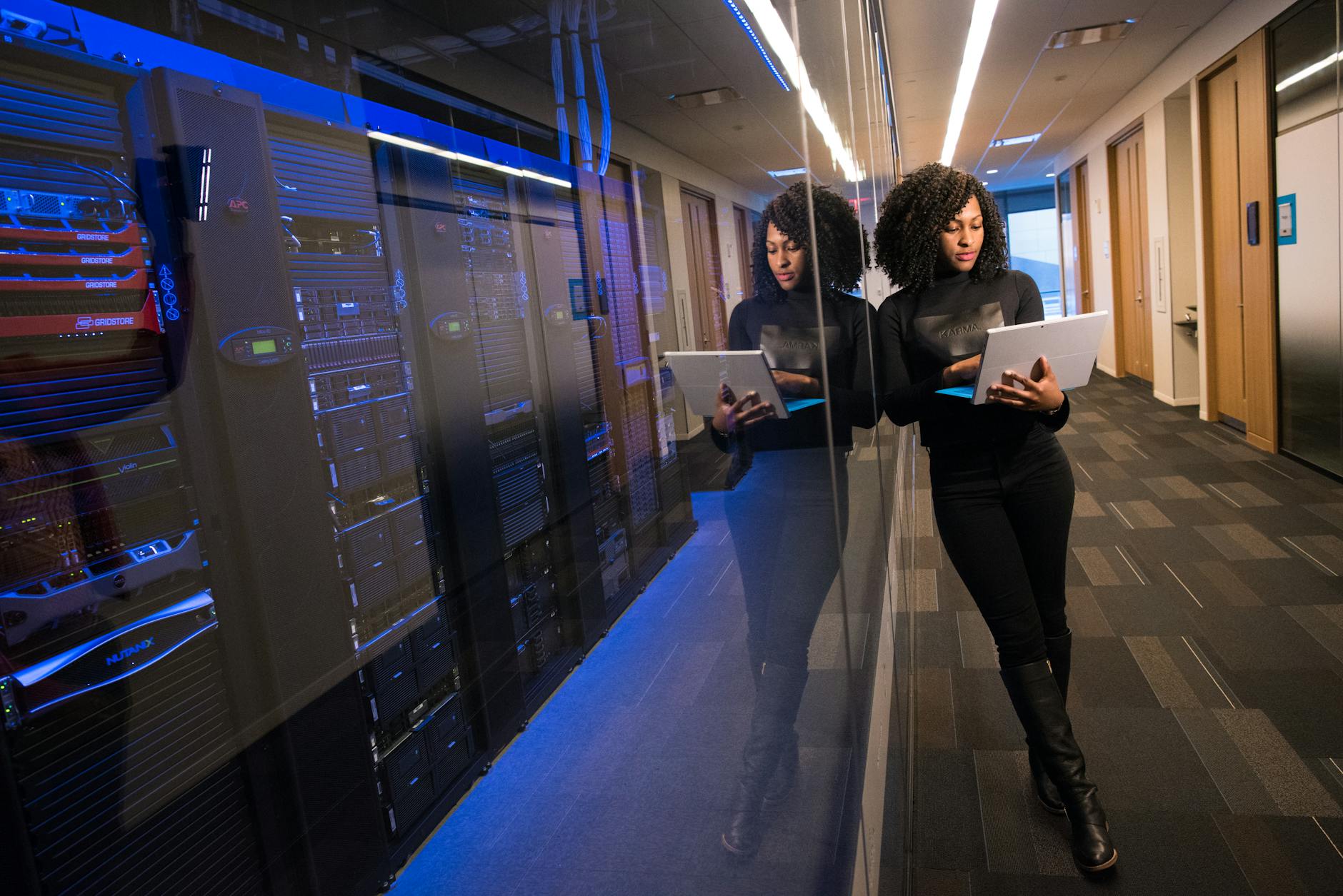 Modern data center server room with network infrastructure and security systems