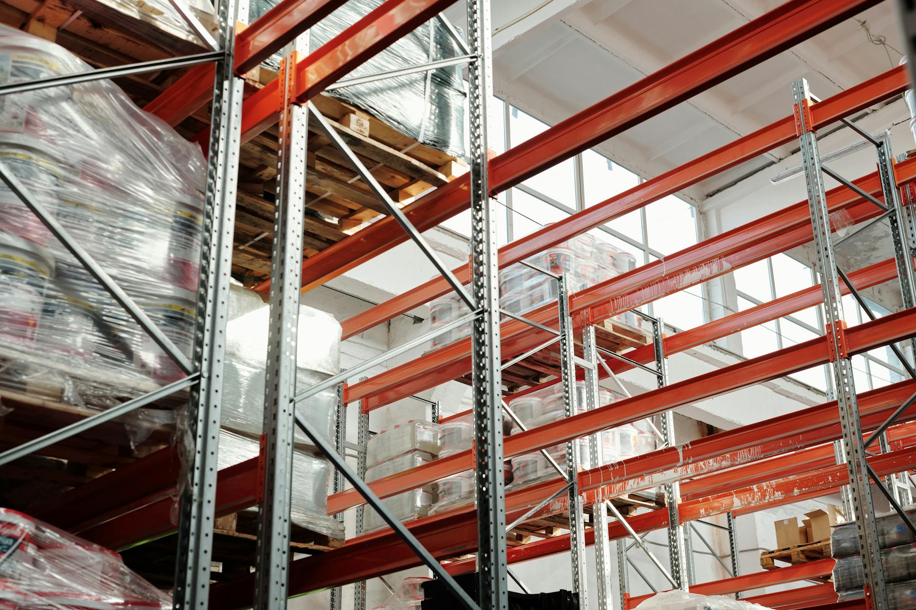 Large warehouse facility with organized inventory representing e-commerce fulfillment operations