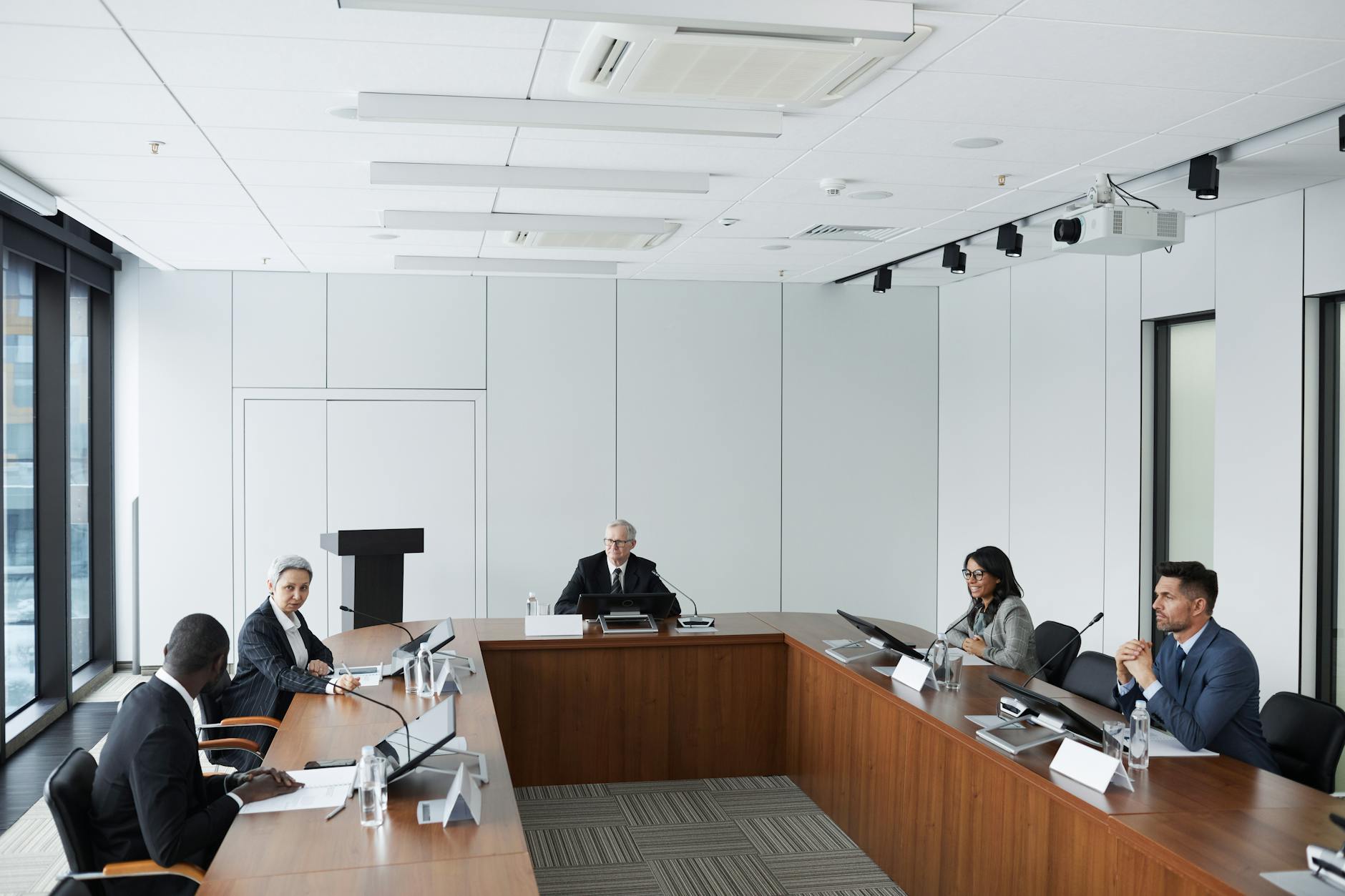 Professional business meeting with technology integration