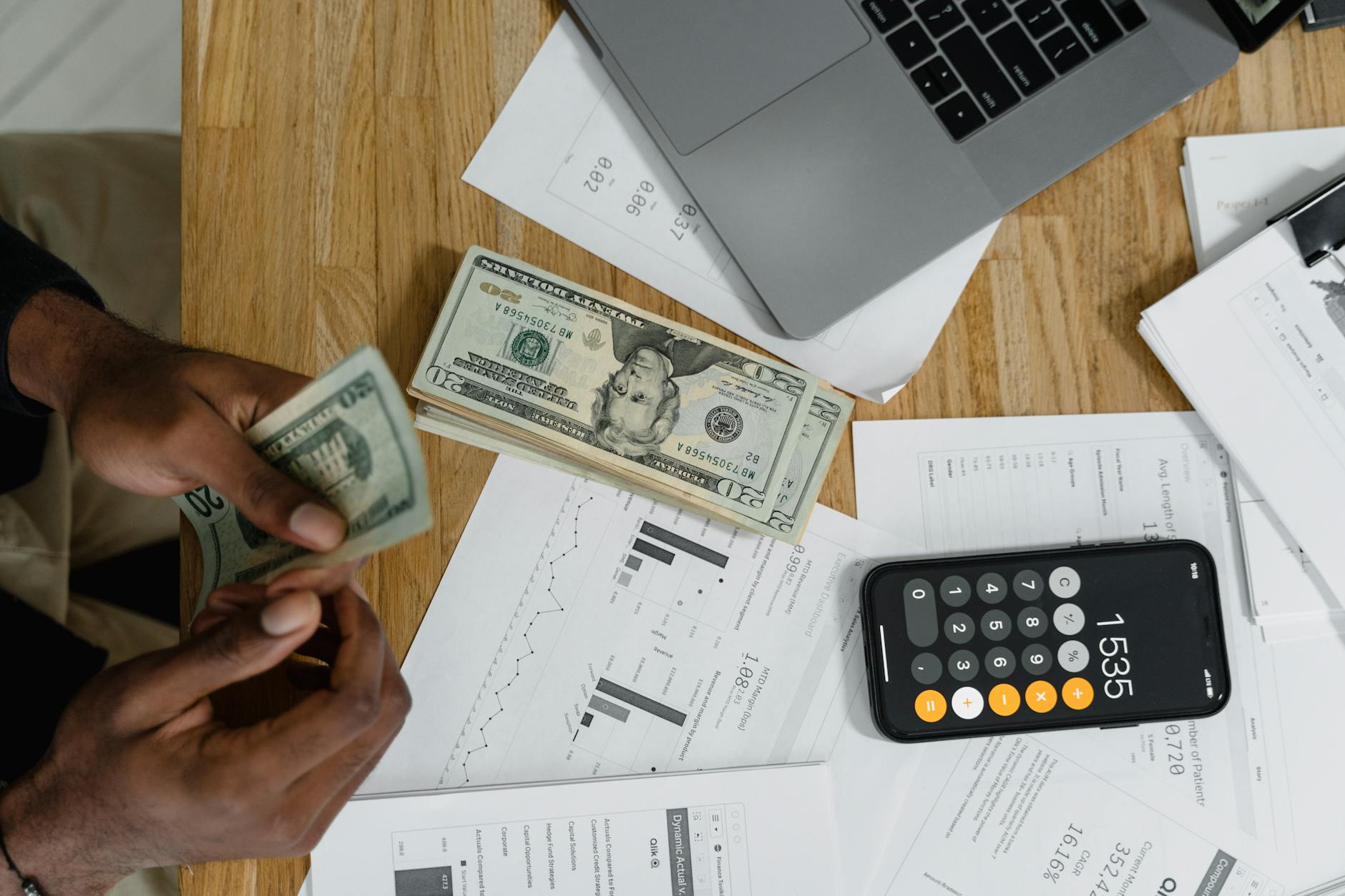 Calculator and financial documents representing economic policy planning and budgeting