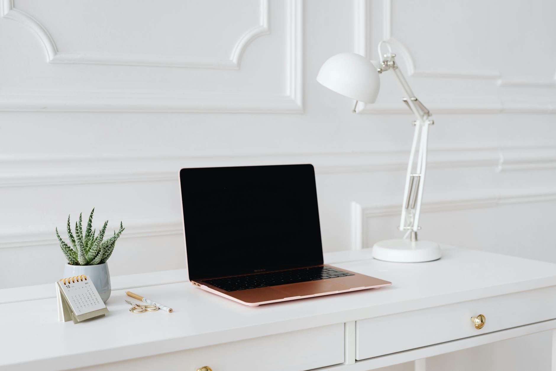 Laptop computer on office desk representing remote work and technology