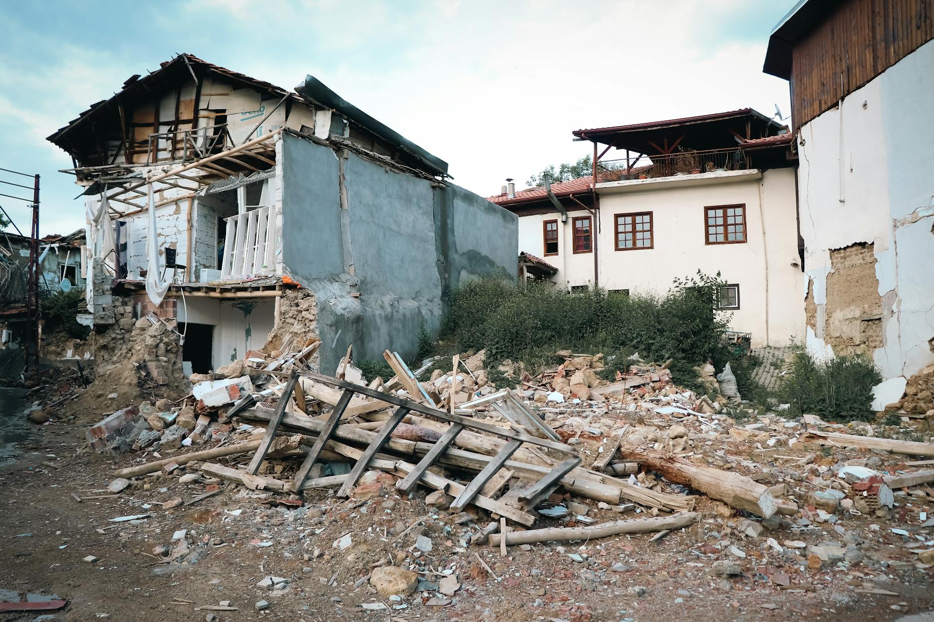 Debris and damaged structures in aftermath of severe weather event