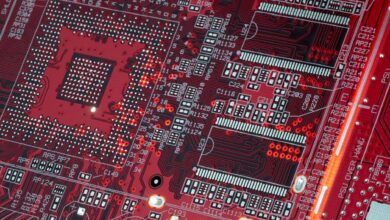Inside view of a modern semiconductor chip manufacturing facility with clean room equipment