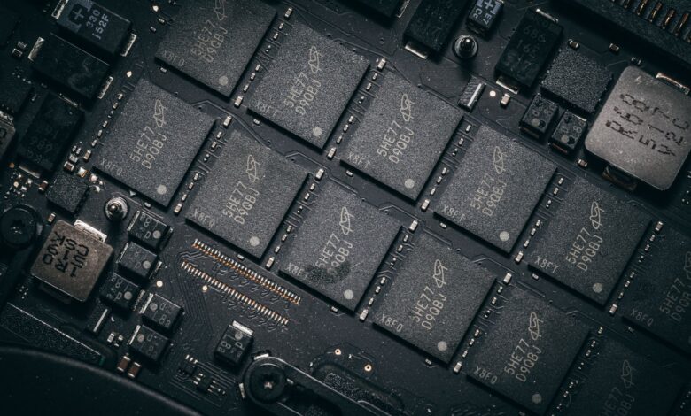 Workers in a semiconductor manufacturing facility working on advanced chip production