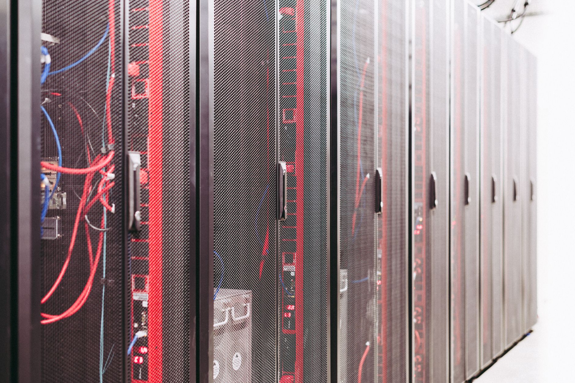 Rows of servers inside a large-scale AI data center facility