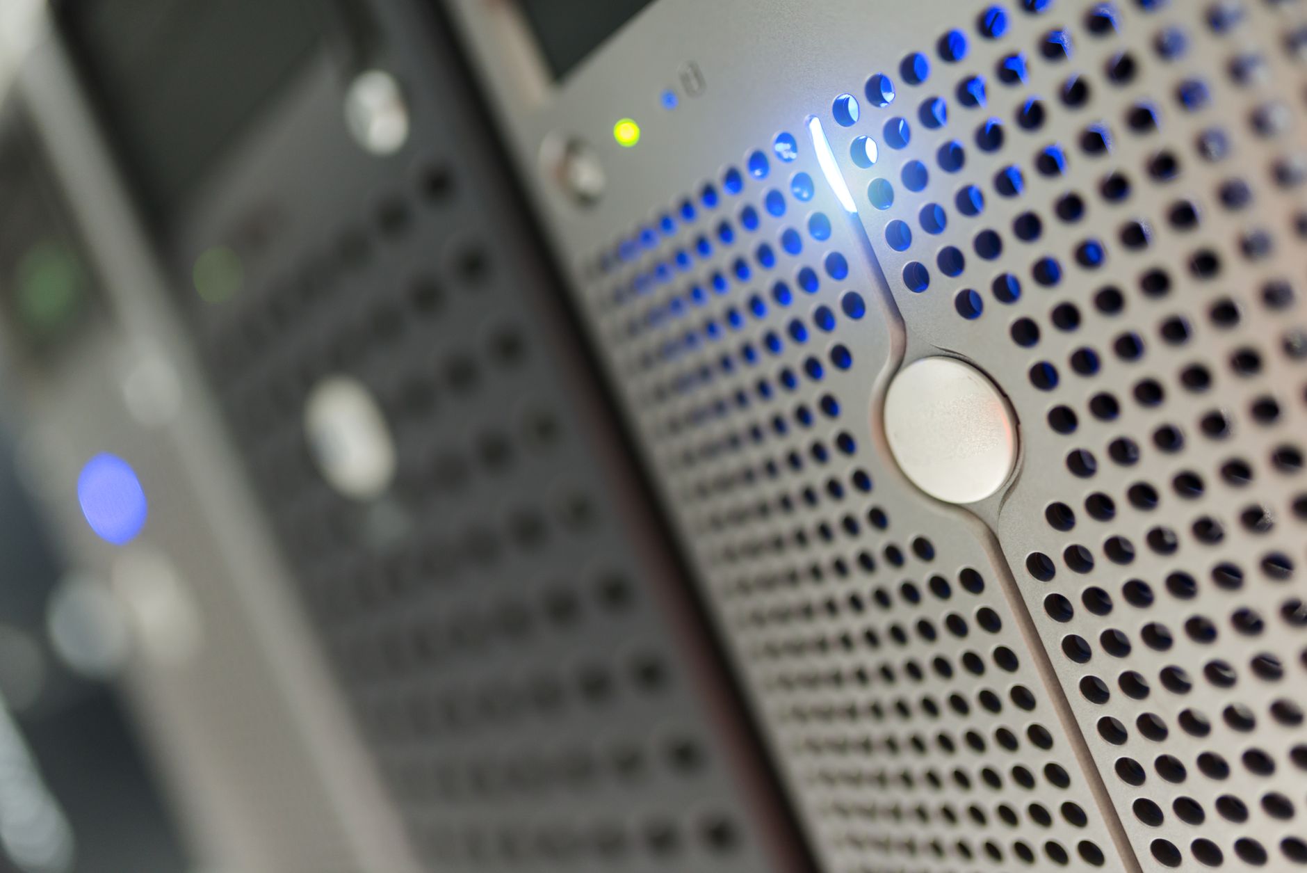 Interior of a cloud computing data center with rows of servers