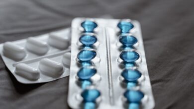 Close-up of prescription medication bottles representing pharmaceutical patent disputes