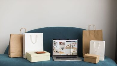 Person managing an online store on a laptop, representing small business e-commerce