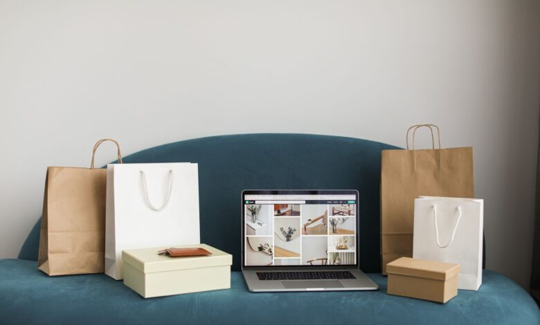 Person managing an online store on a laptop, representing small business e-commerce