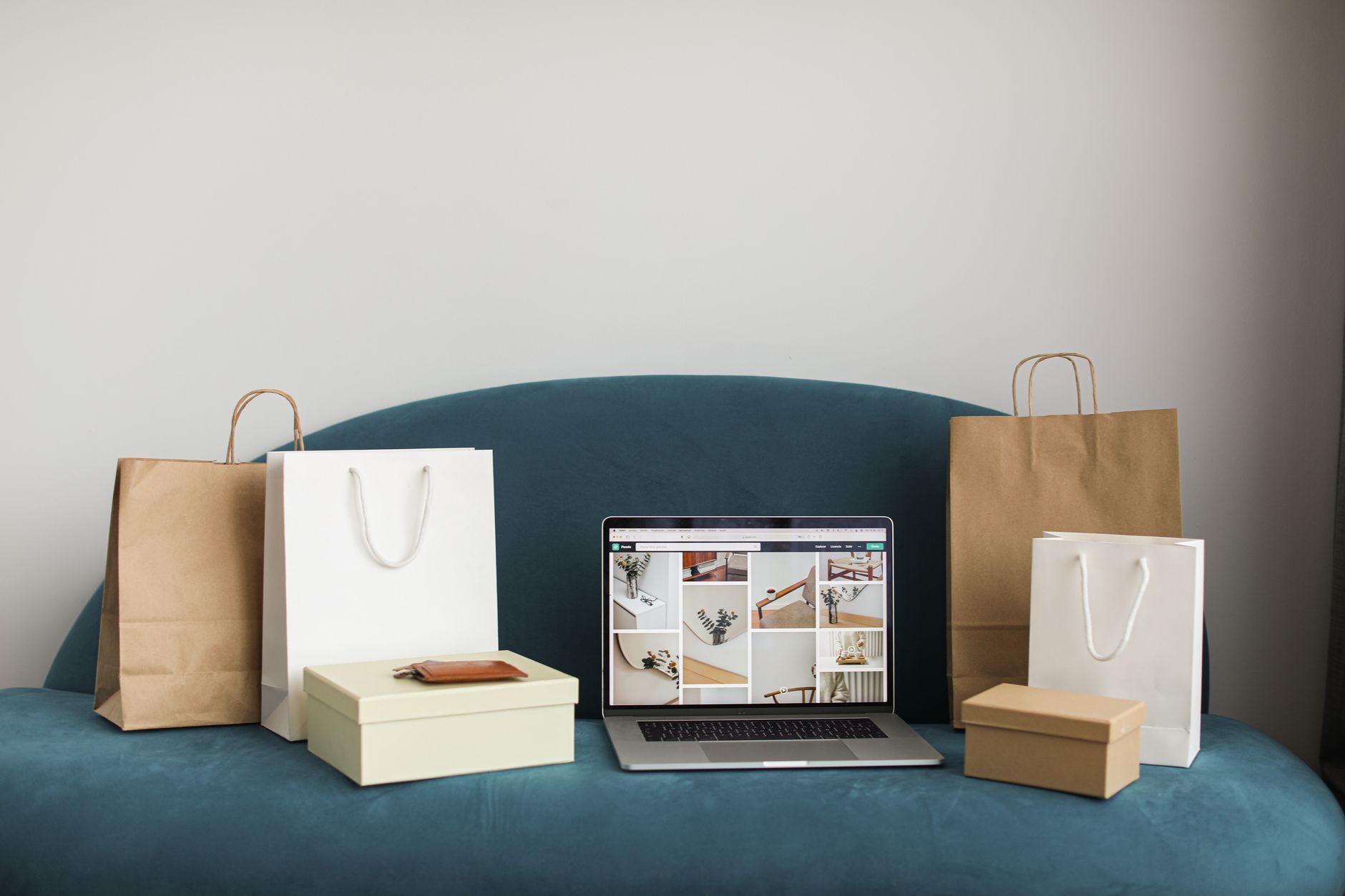 Person managing an online store on a laptop, representing small business e-commerce