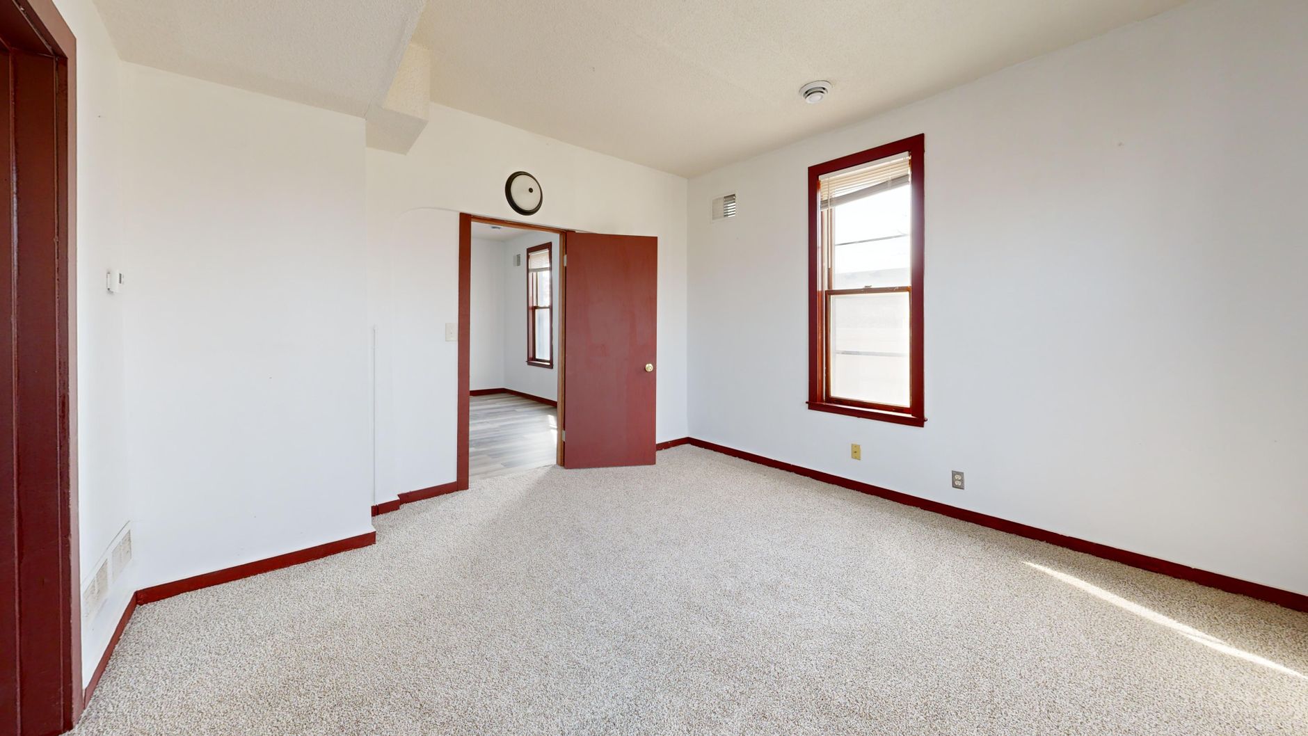 A furnished apartment living room representing long-term Airbnb rental accommodations