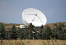 A satellite dish installed at a remote rural property representing internet connectivity in underserved areas