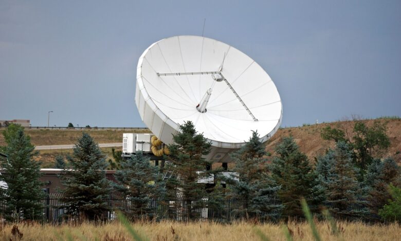 A satellite dish installed at a remote rural property representing internet connectivity in underserved areas