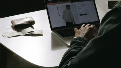 Person browsing an online store on a laptop, representing e-commerce platform competition