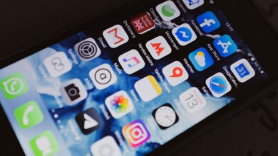 Smartphone screen showing app store interface with download icons