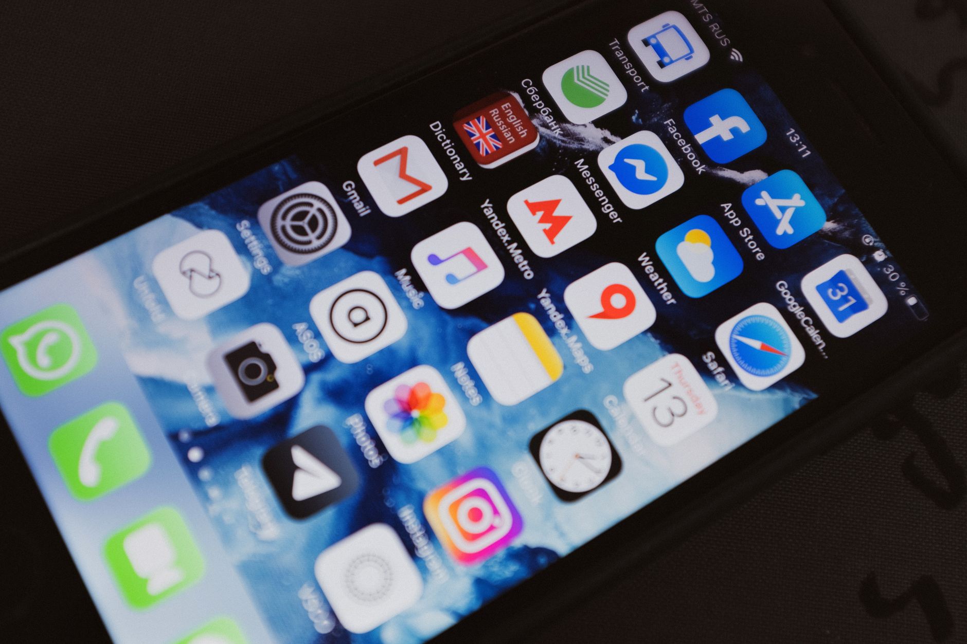 Smartphone screen showing app store interface with download icons