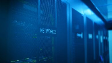 Rows of servers in a modern data center with blue lighting