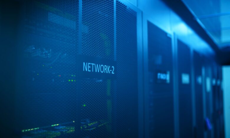 Rows of servers in a modern data center with blue lighting