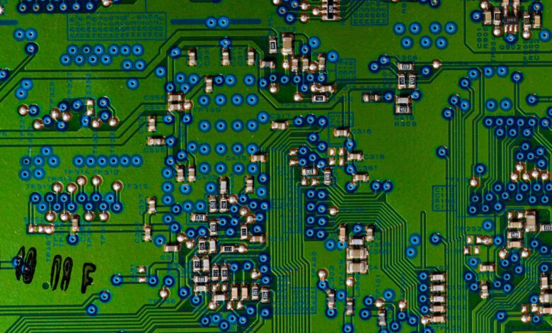 Close-up of a semiconductor microchip circuit board representing mobile processor design