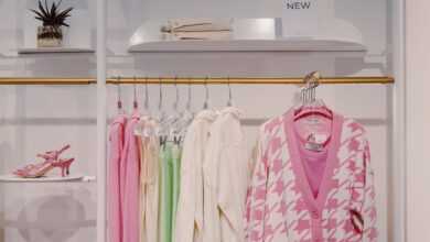 Interior of a modern fast-fashion clothing store with racks of garments