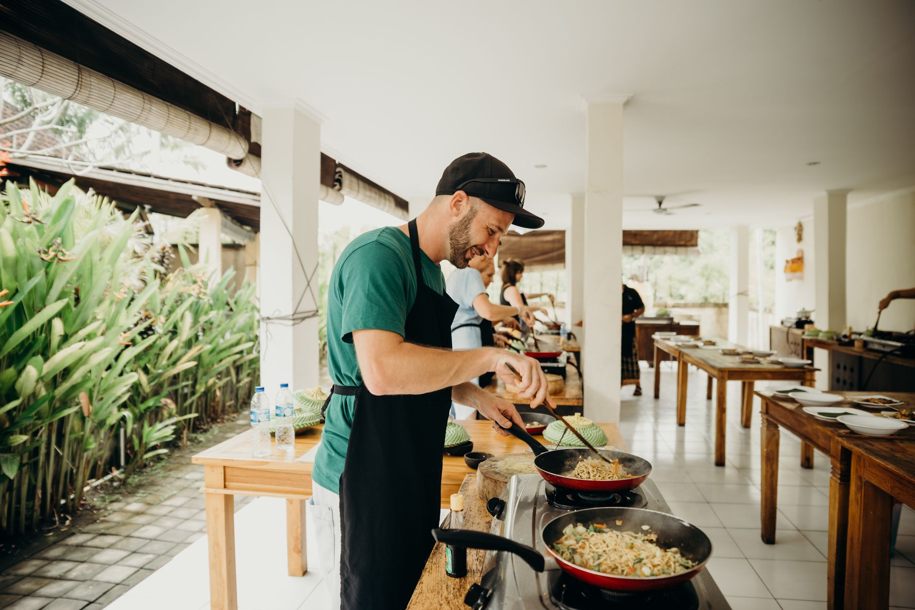 Participants gathered around a table during an intimate local cooking class